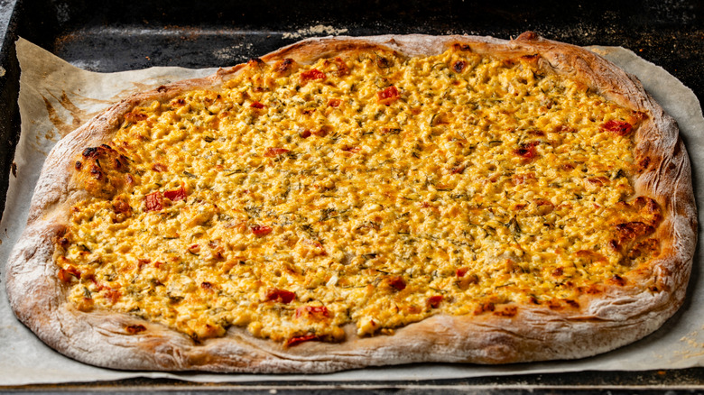 Homemade pizza with cottage cheese topping