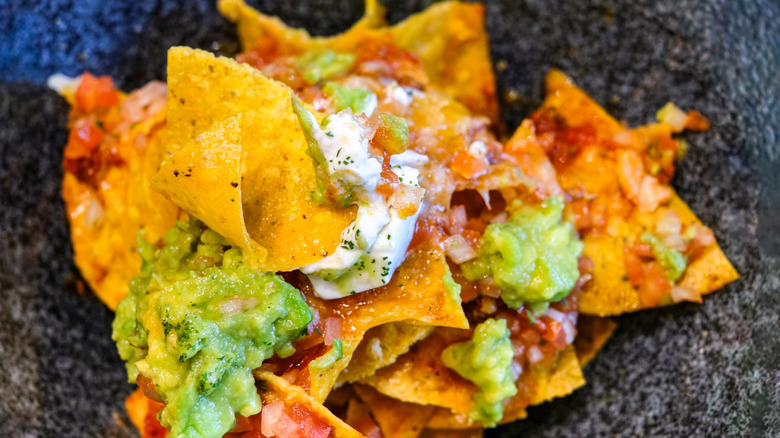 Nachos with sour cream and cottage cheese
