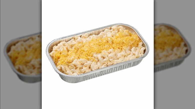 Costco's Kirkland Signature mac and cheese in an aluminum pan on a white background.