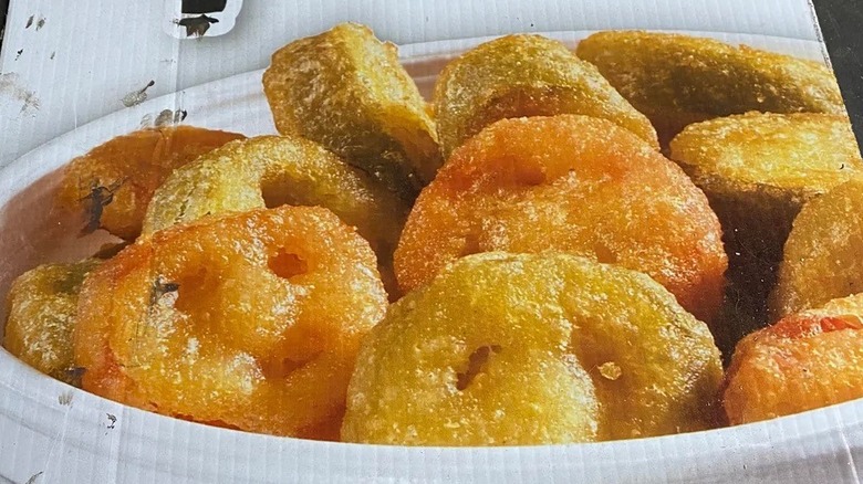 Fried jalapeno rings in a white bowl