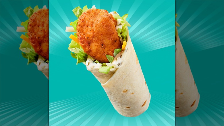 McDonald's chicken snack wrap on a starburst turquoise background