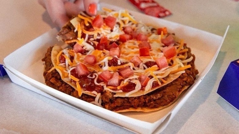 Taco Bell's Mexican pizza in cardboard packagine