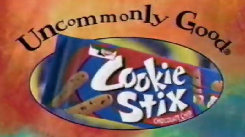 Still of a TV ad with a box of Cookie Stix in frame
