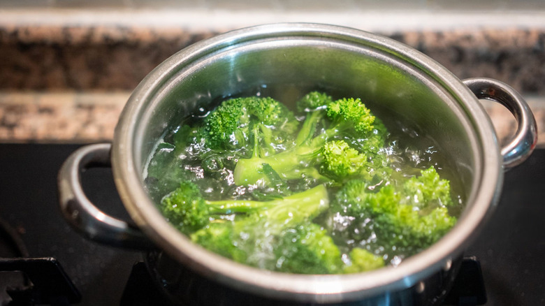Broccoli boiling in a pot on the stovetop