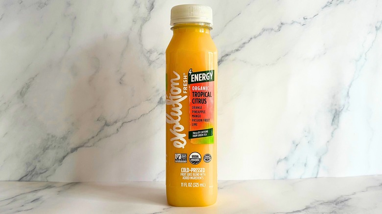 Evolution Fresh Tropical Citrus juice on marble background