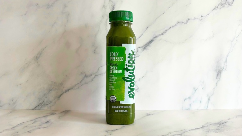 Evolution Fresh Green Devotion juice on marble background