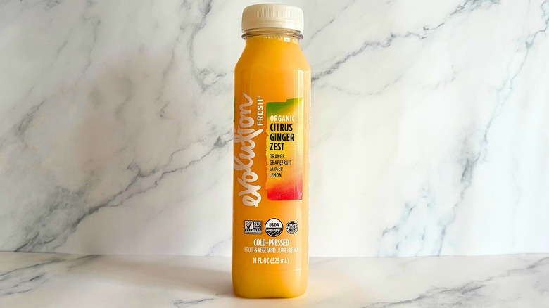 Evolution Fresh Citrus Ginger Zest juice on marble background