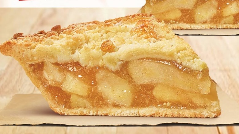 Fast food bakery item pie from Burger King on wooden table