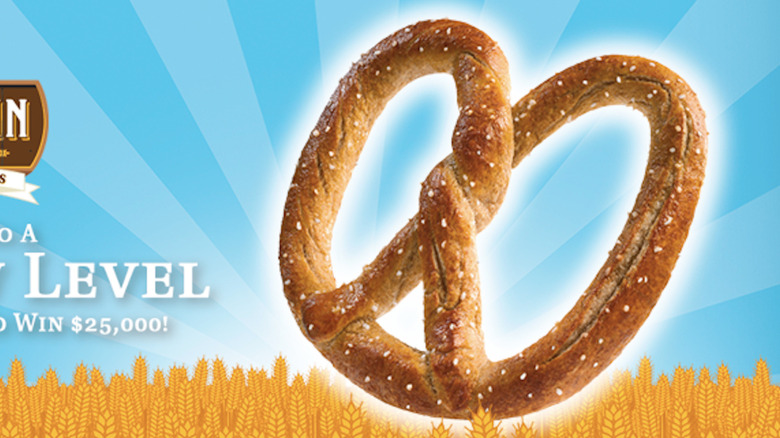 Fast food bakery item pretzel advertisement with wheat from Auntie Anne's