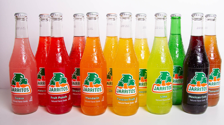 Row of Jarritos bottles in 12 flavors