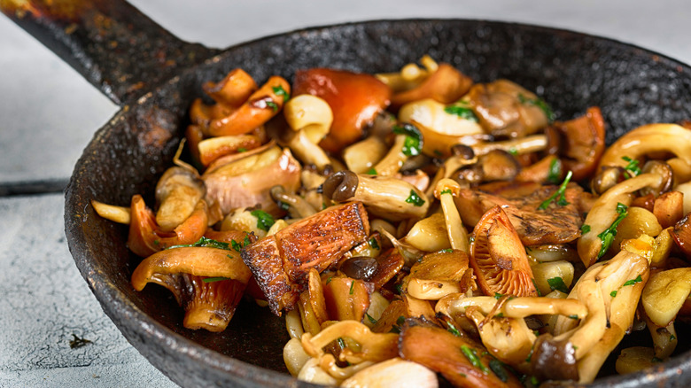Browned mushrooms in a cast iron pan