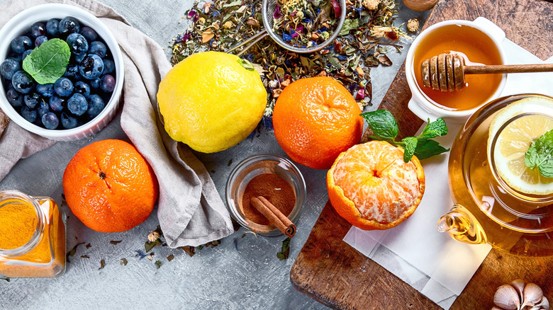 top view of immunity boosting foods on a cutting board and counter