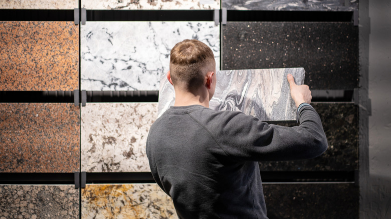 A man shopping for granite countertops