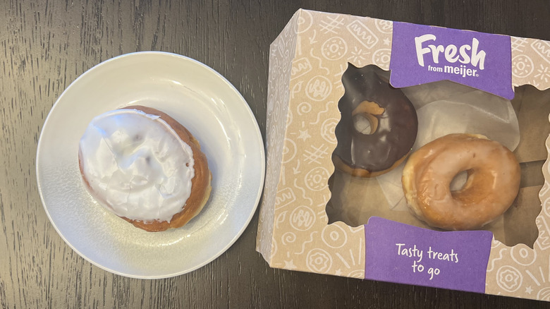 White iced cinnamon donut from Meijer on a plate