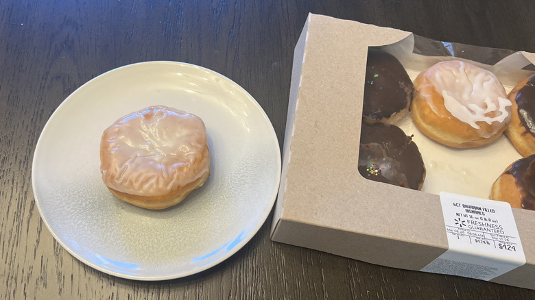 White iced Bavarian filled Bismarck from Walmart on a plate