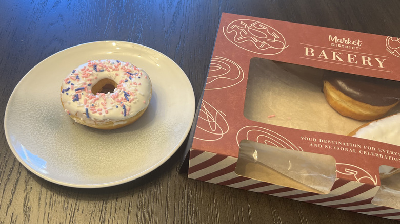 White iced donut with sprinkles from Giant Eagle on a plate
