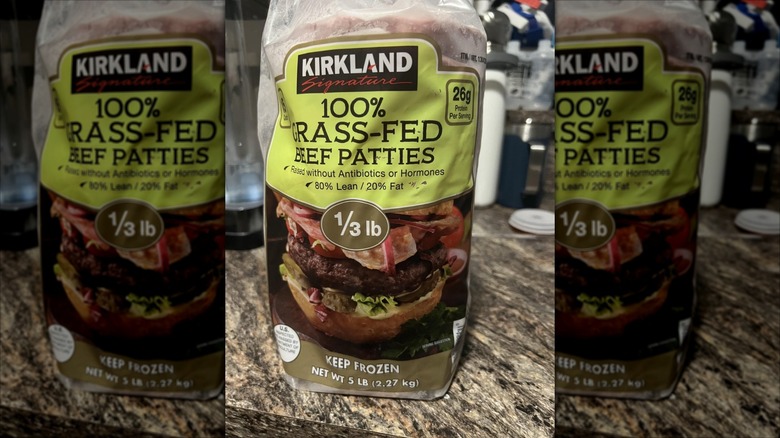 A package of Kirkland Signature Grass-Fed Beef Patties on a kitchen counter