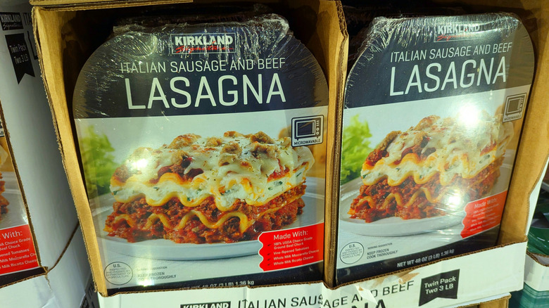 Packages of Kirkland Signature Italian Sausage and Beef Lasagna on display at Costco