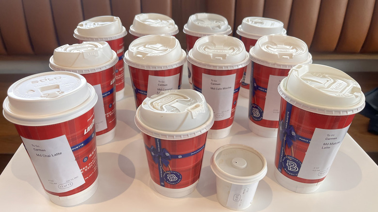 Various Paris Baguette drink cups on a table