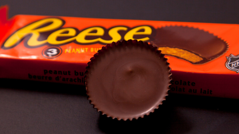 A Reese's Peanut Butter Cup beside a two-pack