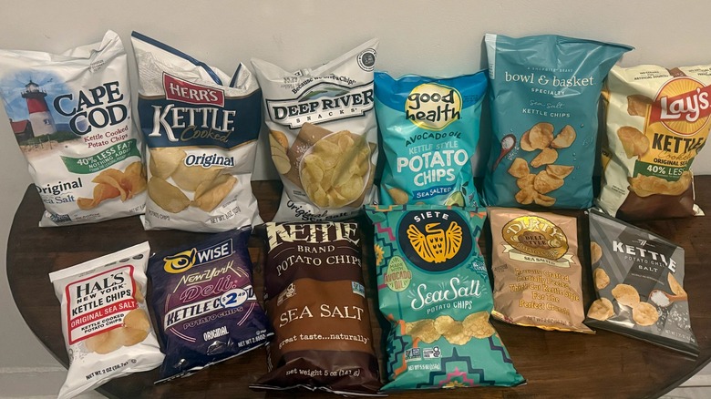 multiple bags of kettle-cooked chips on a table