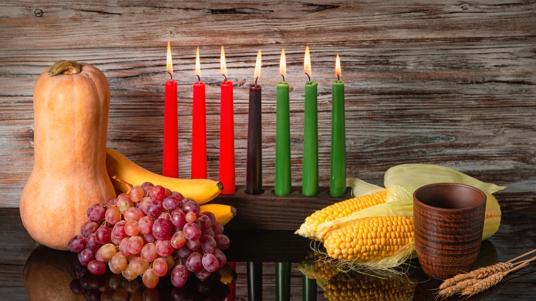 Kwanzaa candles with harvest food
