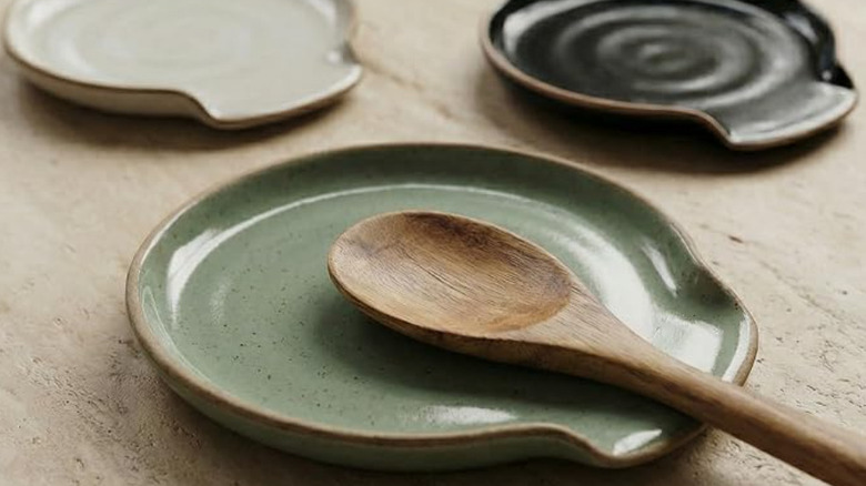 Ceramic spoon rest with wooden spoon