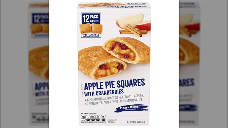 Box of apple pie squares with illustration of product alongside cinnamon sticks and apple slices