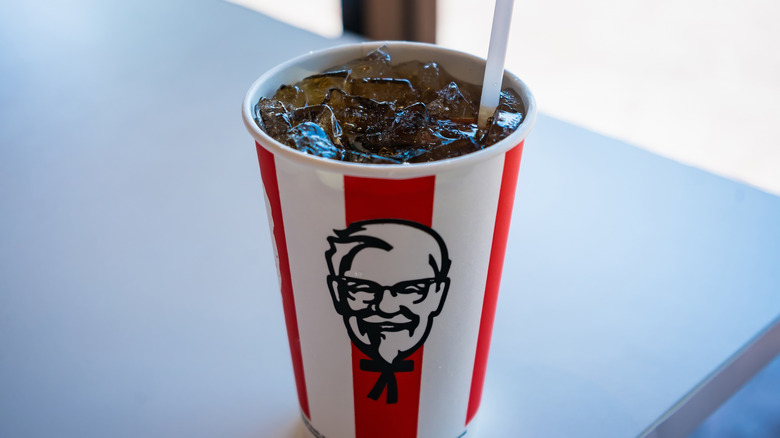 KFC coca cola with ice on restaurant table