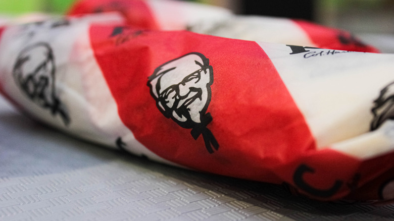 Close up of KFC wrap on outside table
