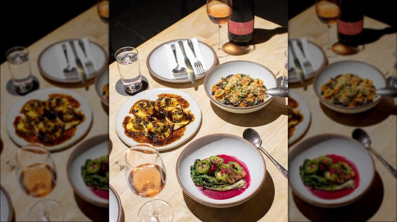 Veal sweetbreads, sqid ink gargenelli, and oxtail ravioli from Boia De Restaurant