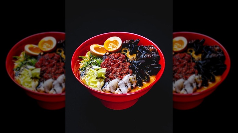 Ramyun noodle soup from Jeju Noodle Bar in a red bowl