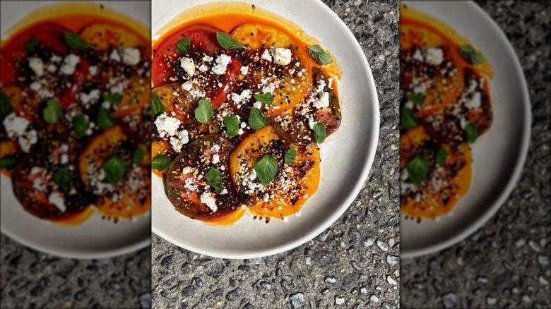 Heirloom tomato salad with smoked queso fresco, basil, and salsa macha at Oxomoco Brooklyn