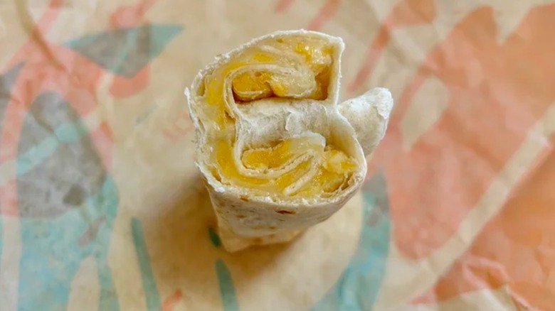 Cheesy roll up on a wrapper