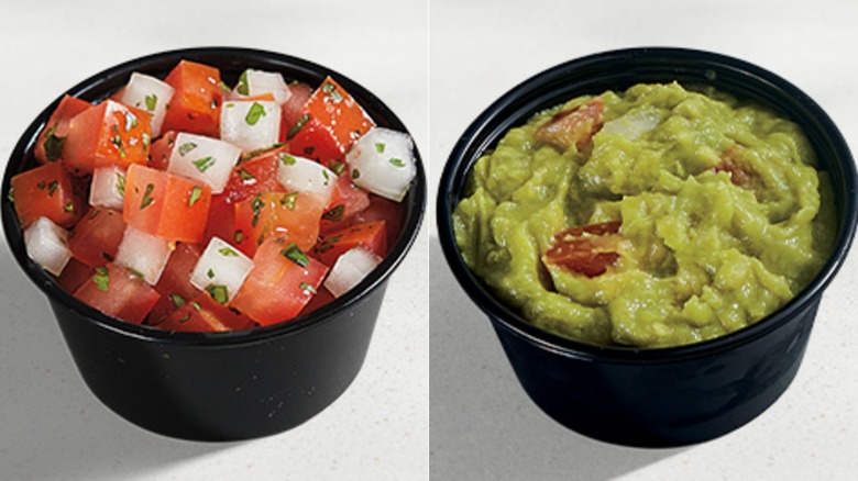 Black container of pico de gallo and black container of guacamole