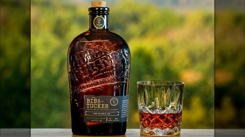 Bottle of Bib & Ticker Classic Six with glass outside