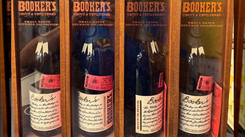 Four bottles of Booker's in cases