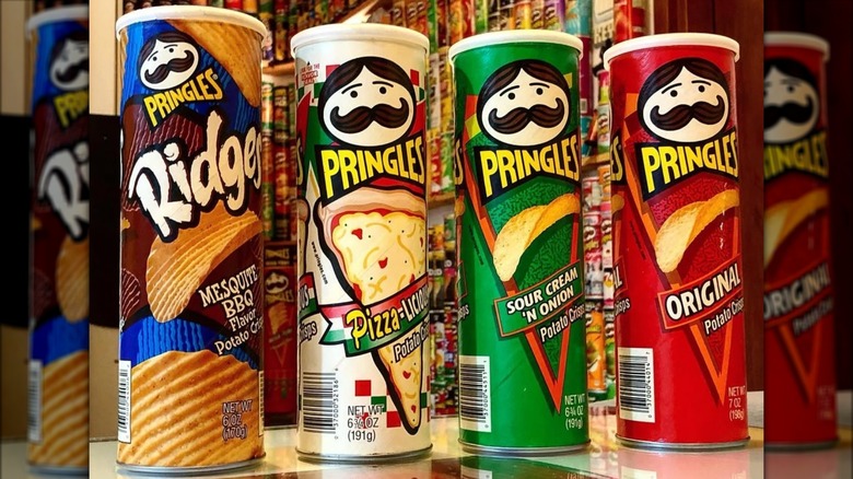 Four 1990s Pringle containers