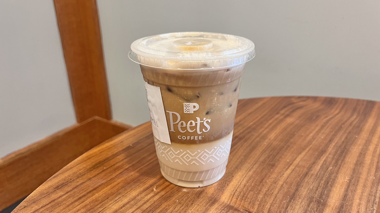 Iced Pistachio Rose Latte on a table