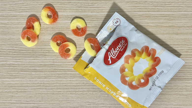 Albanese peach rings coming out of bag.