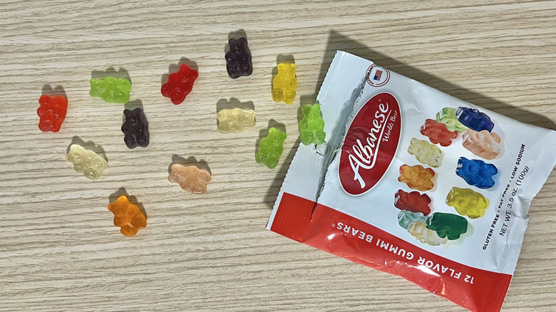 Albanese 12-Flavor Gummi Bears coming out of bag.