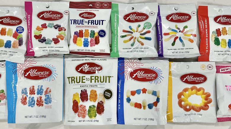 12 bags of Albanese gummy candies.