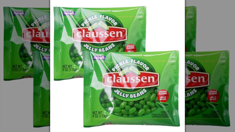 Two green plastic bags of Claussen brand pickle flavored jelly beans