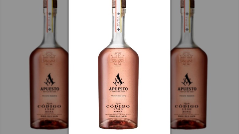 Apuesto bottle on white background