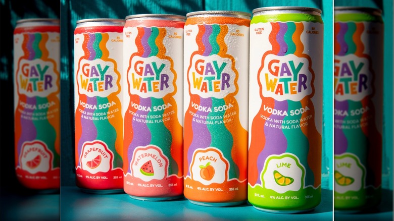 Four Gay Water cans lined up