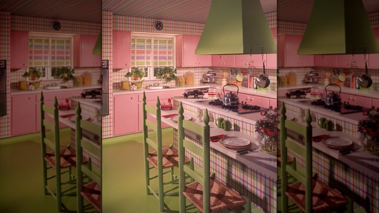 Retro pink and green kitchen with striped wallpaper