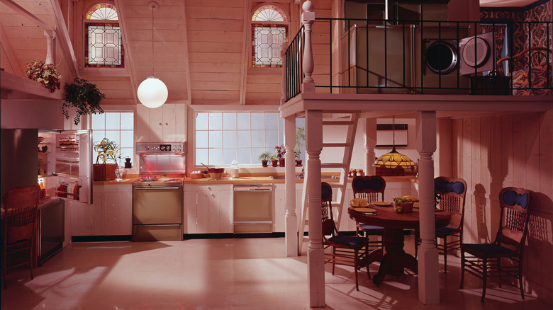 Open-concept 1980s kitchen with a loft