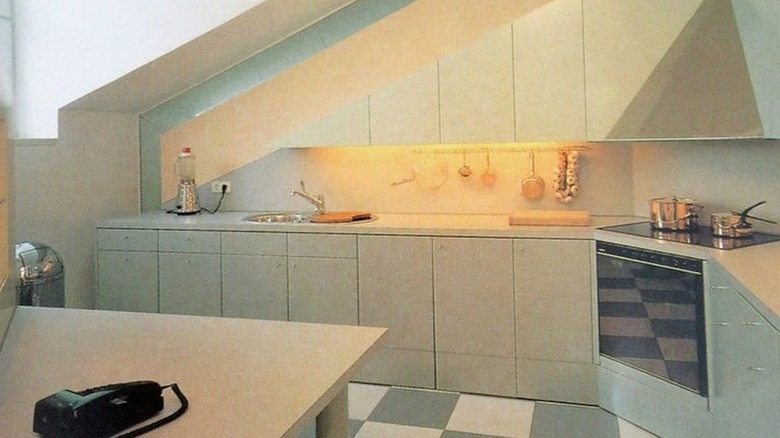 Retro pastel blue kitchen with checkered floors