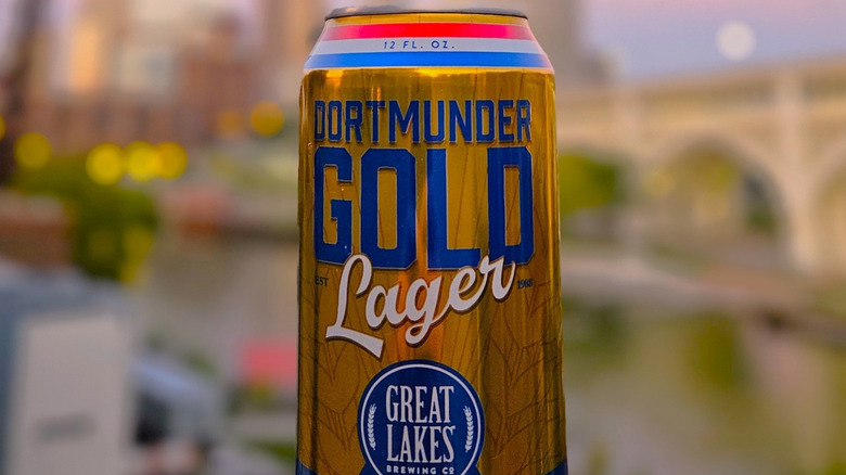 A close up shot of a can of Dortmunder Gold with a blurred background