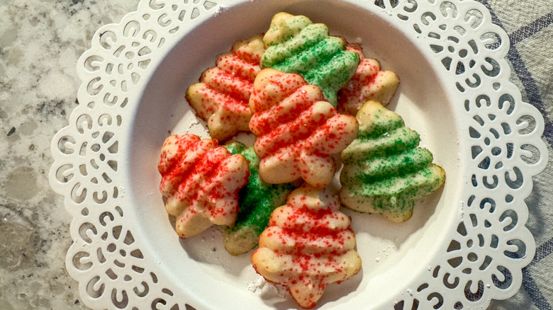 a platter of tree-shaped spritz cookies